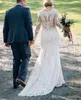 Vintage Lace Mermaid Bröllopsklänningar med Illusion Långärmade Appliqued V Hals med knappar Tillbaka Sweep Train Western Garden Bridal Gowns