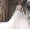 Cape Boat Neck Cathedral Train Floral Wedding Dress Bridal Klänning De vackraste syriska recptionen bröllopsklänningar