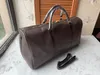 Diseñador-2019 nueva moda hombres mujeres bolsa de viaje bolsas de lona de gran capacidad deporte pu bolsos de equipaje de cuero 55cm71