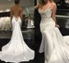 Sexy Ivory Mermaid Dresses Beaded Crystal Backless Spaghetti Straps Satin Ruched Beach Wedding Bride Party Gown
