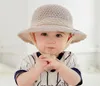 15528春夏の赤ちゃんキッズわら帽子の赤ちゃん子供の魚屋の帽子のかぎ針編みの綿のバケツの帽子