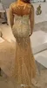 Luxury Beading Split Evening Dresses Arabic Gold Rhinestone Long Sleeve Sheer V neck Mermaid Prom Gowns Crystal Aso Ebi 2019 Pageant Dress