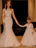 2019 New Cute Girls Dresses Backless Gown ff Shoulder Bateau Long Sleeves Flower Girls' Dresses With Sash Princess Lace Appliques Tulle Wed