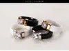 Anillos de cerámica negros al por mayor-blanco más circonio cúbico para mujeres Color oro Acero inoxidable Mujeres Anillo de bodas Joyería de compromiso