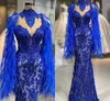 2019 Royal Blue Prom Dress Pizzo Appliqued Perle Piuma Sparkly Mermaid Abiti da sera Abiti da festa Abiti da spettacolo sexy con collo alto africano