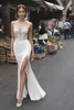 Stunning Mermaid Backless Beach Bröllopsklänningar Sheer Bateau Neck Side Split Bridal Gowns Lace Appliqued Golvlängd Robes de Mariée