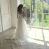 2019 Vestido de novia largo de corte en A, elegante, suave, de tul, sin espalda, encaje, vestido de novia hecho a medida de talla grande