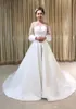 Goedkoop eenvoudige elegante Boemische sexy witte jumpsuits jurken met lange mouwen zie door nek trouwjurken Vestido de noiva