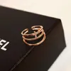 Korean version of the trend punk three-layer zircon plated 18k gold female ring simple and exquisite female wild ring jewelry gift247n