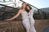 2020 Mermaid Wedding Dresses Split Lace Beaded with Feather One Shoulder Illution Long Sleeves Wedding Dress Custom Made Vestidos De Novia