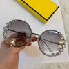 Vente en gros - Lunettes de soleil rondes en métal de marque de concepteur de femmes Diamond Border Style Luxury Authentic Glasses UV400 Lens Sunshades eyewear with box