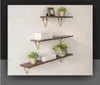 Racks Iron Solid Wood Mur Shelf Manufacturers Rangers Rangers Decoration Sanging Living Room Bedroom One Word Cadre de partition