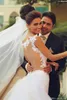 White Arabic Sexy Lace Wedding Dresses New Sweetheart Illusion Back Appliques Beaded Sheer Trumpet Backless Bridal Gowns Vestidos De Novia less