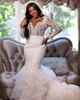 Abiti da sposa a sirena taglie forti Collo alto con applicazioni di pizzo Gonna a strati Abito da sposa sexy con scollatura sulla schiena a maniche lunghe personalizzato