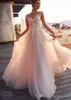 Blush Pink A Line Wedding Dresses 2020 Cap Short Sleeves Sheer Neck Illusion Button Back Lace Appliques Bridal Gowns Beach Wedding Dresses