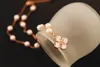 Wholesale- 45cm 18k gold Korean style fashion designer short woman classic elegant pearl statemen choker necklace with flower pendant