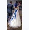 Mangas Vestidos elegantes Apliques de encaje corto Cinta de raso azul real Corsé Espalda Longitud del piso Vestido de novia de boda campestre