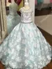 Famoso designer ritzee Girl Pageant Dresses 2019 Perline collo maniche ad aletta Bambina infantile Abiti da cerimonia formale Abito da ballo formale