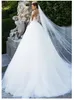 A line wedding dress sheer neck long sleeves lace appliques top tulle bridal gowns with sweep train custom made