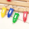 LED Flashlight Blue Light Bearnote Counter -keychain Flighting Toy Pagoda Panchnote Counter Lamp Stalls بيع البضائع بالجملة