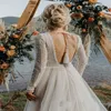 Sexy Backless Bohemia Lange Mouw Trouwjurken V-hals Strand Bruidsjurk Boho Kant Geappliceerd Ruched Tulle Sweep Trein Vestidos de Novia