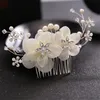 花嫁の手作りの結婚式の冠の花の真珠のヘアアクセサリーのためのファッション自由州のウェディングヘッドドレス髪の飾りブライダルジュエリー