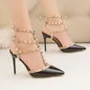 New out Roman fashion sandals Fine high-heeled bright spikesWestern style nightclub fine heels lacquer leather metal