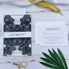 Kişiselleştirilmiş ek ve göbek bandı ile süslü romantik siyah çiçek lazer kesim düğün davetiyesi, 20+ renk mevcut