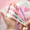 16 stil kreativ söt tecknad unicorn ljus penna LED ljus kiseldioxid huvud gel penna 0,5 mm kontors skola levererar brevpapper studentgåva