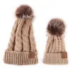 Chapeau tricoté Parent-enfant hiver chaud Imitation fourrure de raton laveur Pom chapeau bébé maman solide Pom Pom bonnet casquette de Ski casquettes tricotées