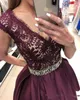 Dark Burgundy Short Homecoming Dresses with Beaded Sash Lace Capped Sleeves Graduation Party Gowns V Neck Maid of Honor Dress