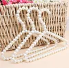 20cm Plast Pearl Beaded Kläder Klänning Coat Hangers Bröllop för Pet Kid Barn Spara utrymme Förvaring Arrangör