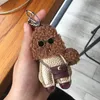 Top porte-clés version coréenne du créatif mignon petit sac en peluche pendentif ornements porte-clés de voiture à la main en peluche cadeaux d'amoureux de chien