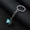 Lysande Glöd i Dark Keychain Galaxy Universe Glass Ball Cabochon Nyckelringar Bilväska Key Ringar Mode Smycken Kvinnor Present