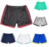 Män Fitness Bodybuilding Shorts Man Zip Pocket Gym träning Man Andas Mesh Snabbtork Sportkläder Jogger Strand Korta Byxor