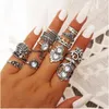 Bohemian Knuckles Ring Set Silver Retro Skuren ihålig Palm Hjärtformad Opal Crown Leaf Joint Ring 16 Piece Set Kvinna