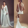 Elihav Sasson robes de mariée sirène avec de longues enveloppes col en V profond perles dos nu plage robes de mariée robe de mari￩e