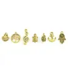 Mixed Designs Retro Golden Color Key Rudder Shell Turtle Bird Hand Tower Bike Butterfly Owl ... Charms för DIY Smycken Montering 50PC / Väska