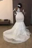 Afrikanska Billiga Mermaid Bröllopsklänningar Långärmade Illusion Lace Appliques Beaded Tulle Open Back Sweep Train Custom Formal Bridal Gowns
