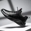 Nuevos zapatos para correr para hombre y mujer Zapatillas de deporte de diseñador con plataforma de cuero blanco y negro triples Zapatillas de deporte para hombre Marca casera Hecho en China