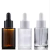 Groothandel 30 ml platte schouder frosted clear amber glas ronde etherische olie serum fles met glazen druppelaar voor cosmetica essentie