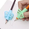 2019 Pen Grips dois dedos de silicone Três cores misturando Student papelaria escrito postura corrector lápis tampa do amor escrita