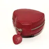 Caja de embalaje de la exhibición de la exhibición de la exhibición del corazón de cuero rojo de la mejor calidad para la pulsera de los encantos de Pandora Bolsas de regalo de la joyería de cuero originales