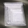 100pcs / lot Vente Chaude 10 Tailles Blanc Organza Bijoux Sac Cadeau Pour Mariage faveurs, perles, bijoux Toutes sortes de bonbons A077