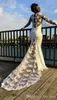 Nuovo arrivo Abiti da sposa africani nigeriani Mermiad Collo gioiello Vedere attraverso Abiti da sposa con applicazioni di pizzo a maniche lunghe Vestido De Noiva