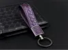 Luxury Zinc Alloy Keychains Fashion Design Unisex Weaving Leather Keyrings Solid Color Cowhide Keychain Men Women Key Rings BirthD253e