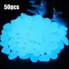 50pcs glow in the dark stones luminous pebbles Rocks Stone for Garden Plants ormantants通路水族館水槽パーティーの装飾