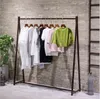 Pokaż stojak o żelaznej sztuce Półka na ubrania w meble handlowe Loft Amerykański Shop Shop Simple Damskie Tkaniny Sklep Lądujący Odzież
