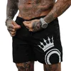 Fitness bodybuilding mens sommar casual cool kort byxor röd svart manlig jogger träning strand shorts för män