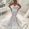 Abiti da sposa lunghi a sirena in pizzo sexy Applicazioni con volant Abiti da sposa alla moda Abiti da sposa con lacci Robe De Mariee